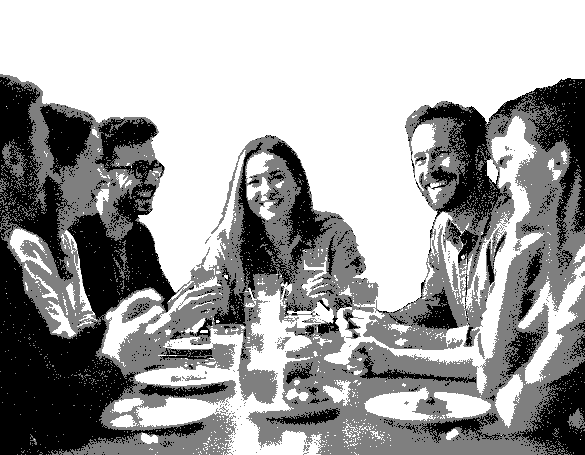 People lauging around a table